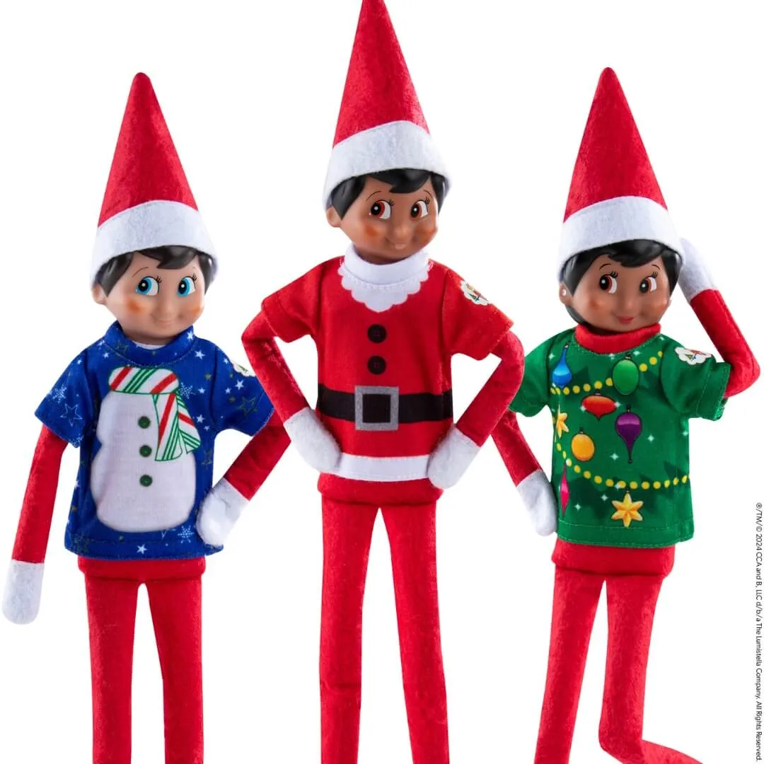 The Elf on the Shelf® Claus Couture Collection® Christmas Tee Pack: 3 Party Tees and Collectible Carrying case